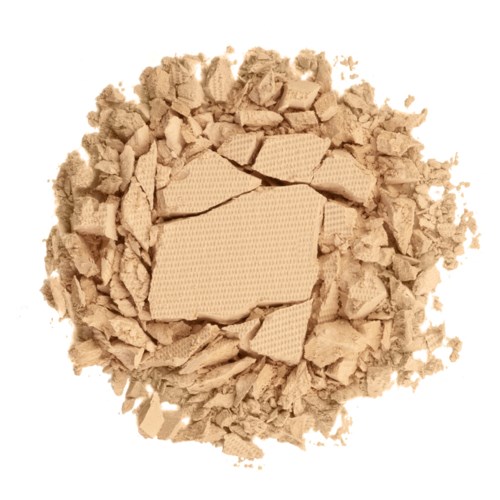 Zerbrochene beige Tabletten umgeben von zerbröselten Stücken, möglicherweise Medikamente oder Drogen.