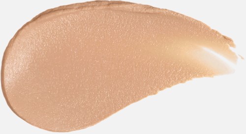 En beige flytande sminkprov med slät, krämig textur och lätt glans.