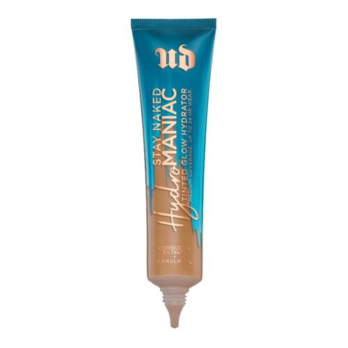 En tub med hudplejeprodukt i blå og beige farver, mærket 'Stay Naked Hydra-Visor' og '#1 glow with your aura.'
