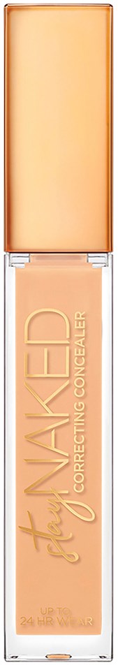 En tube concealer med gennemsigtigt låg viser ferskenfarvet produkt indeni.