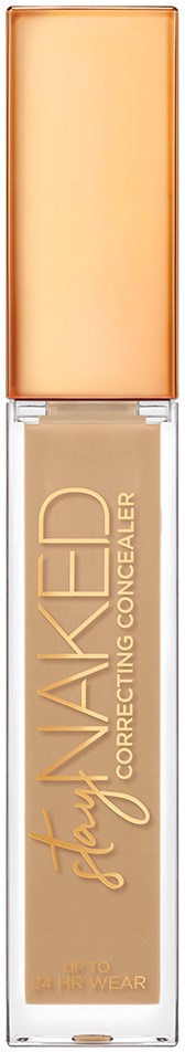 En concealer i rør med ferskenfarvet låg og gennemsigtig krop, der viser beige væske.