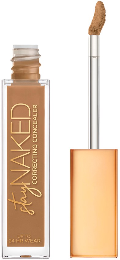 En concealer med påføringsbørste i en gennemsigtig flaske, mærket "Stay Naked."