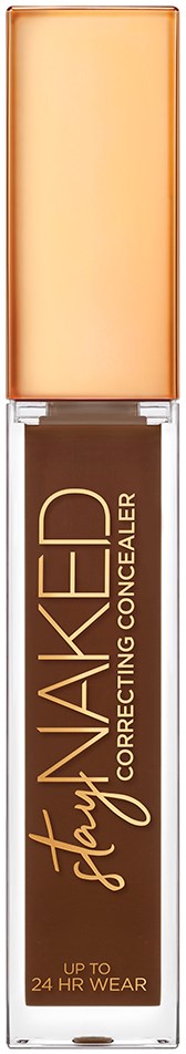 En foundationsflaske med lys beige låg og gennemsigtig krop mærket 'Stay Naked' og 'Correcting Concealer'.