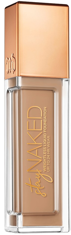 En foundationflaska med en roséguld-lock, genomskinligt glas som visar beige vätska och guldbokstäver.