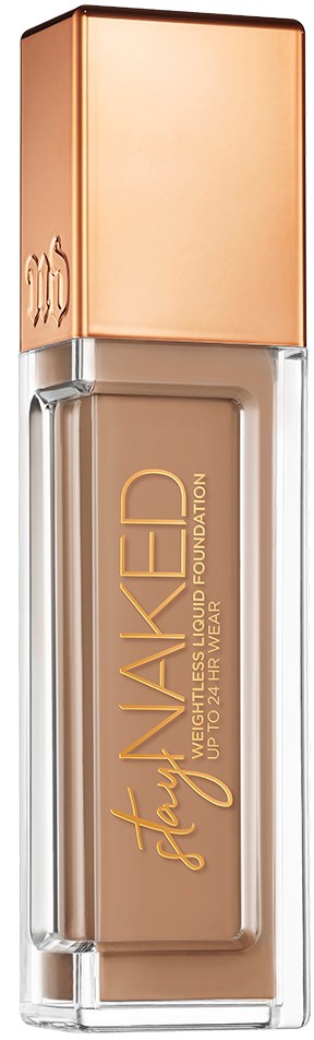 En flaske med flytende foundation med en ferskenfarget kork og gjennomsiktig kropp som viser den beige produktet inni.