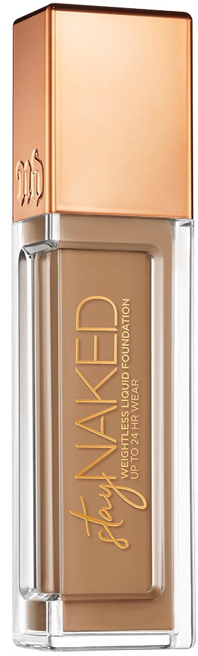 En foundationflaska med beige vätska, ett roséguldslock och guldbokstäver som säger "Stay Skin Tinted."
