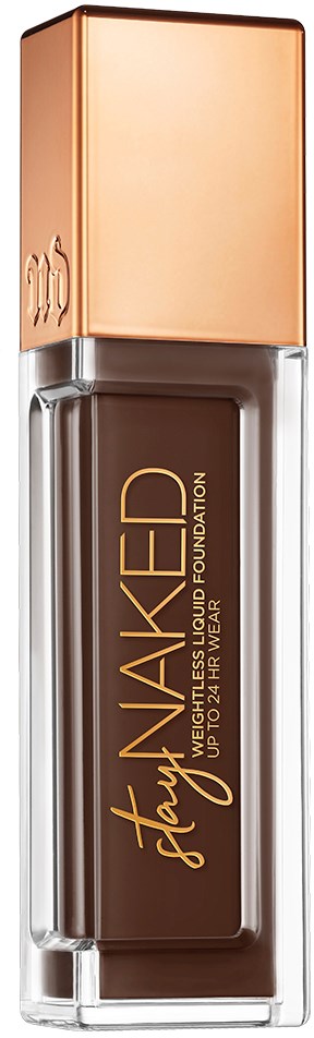En flytande foundation i en glasflaska med ett roséguldslock och orange etikett, visar varumärket och produkttypen.