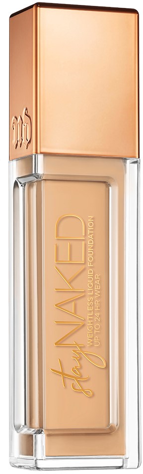 En foundationflaska med locket i roséguld och beige vätska inuti. Varumärkesnamnet 'STAY MADEY' står på den.