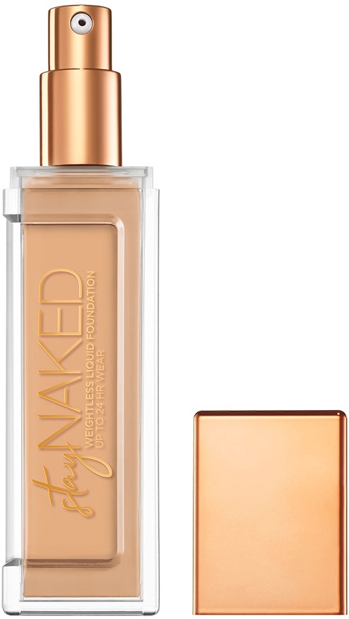 En foundationflaska med spraytoppen, märkt "Stay Naked" med en ros gold-färgad locket.