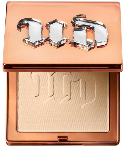 A makeup compact with a rose gold case, and a lid that says 'ad' in shiny 3D letters.