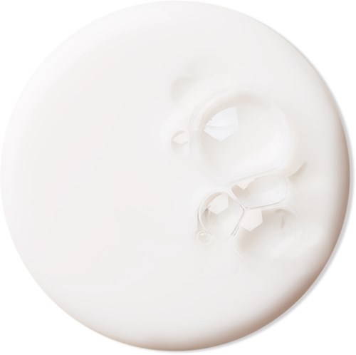 White cream with a face design, showing eyes, nose, and lips on the surface.