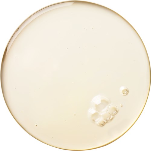 A round, flat, transparent dish with a few small bubbles inside. The surface is smooth and clear.