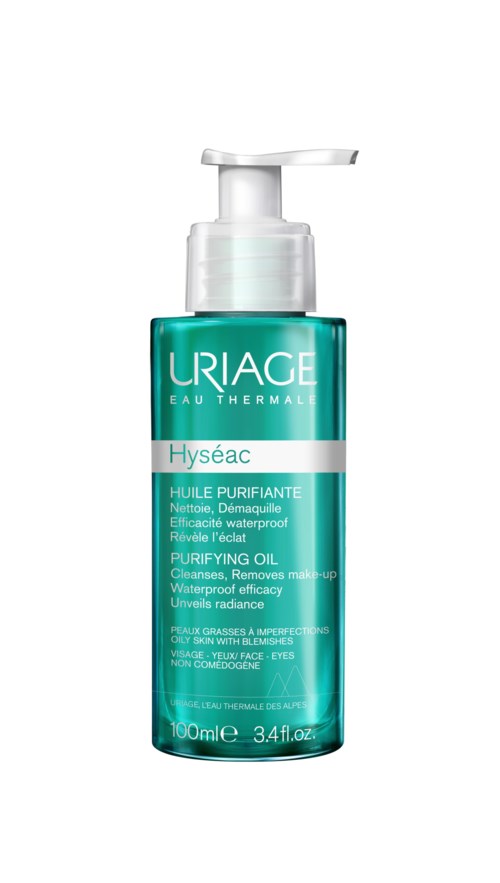 En turkis flaske med pumpe, merket 'Uriage Hyséac Purifying Oil' for hudpleie, vanntett og egnet for ansiktet og øynene.