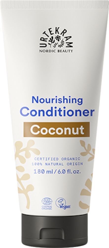 En hvit tube med hårbalsam merket 'Nourishing Conditioner Coconut' med blader og tekst om økologiske og veganske egenskaper.