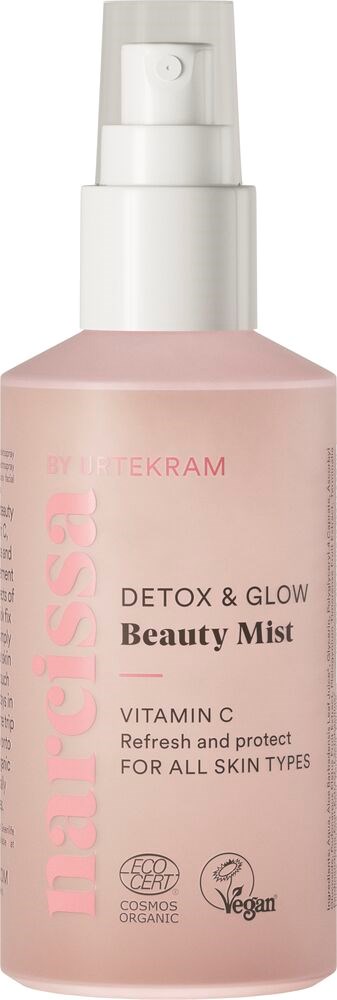 En rosa sprayflaske merket 'Detox & Glow Beauty Mist' med vitamin C for alle hudtyper, cruelt free og vegansk.