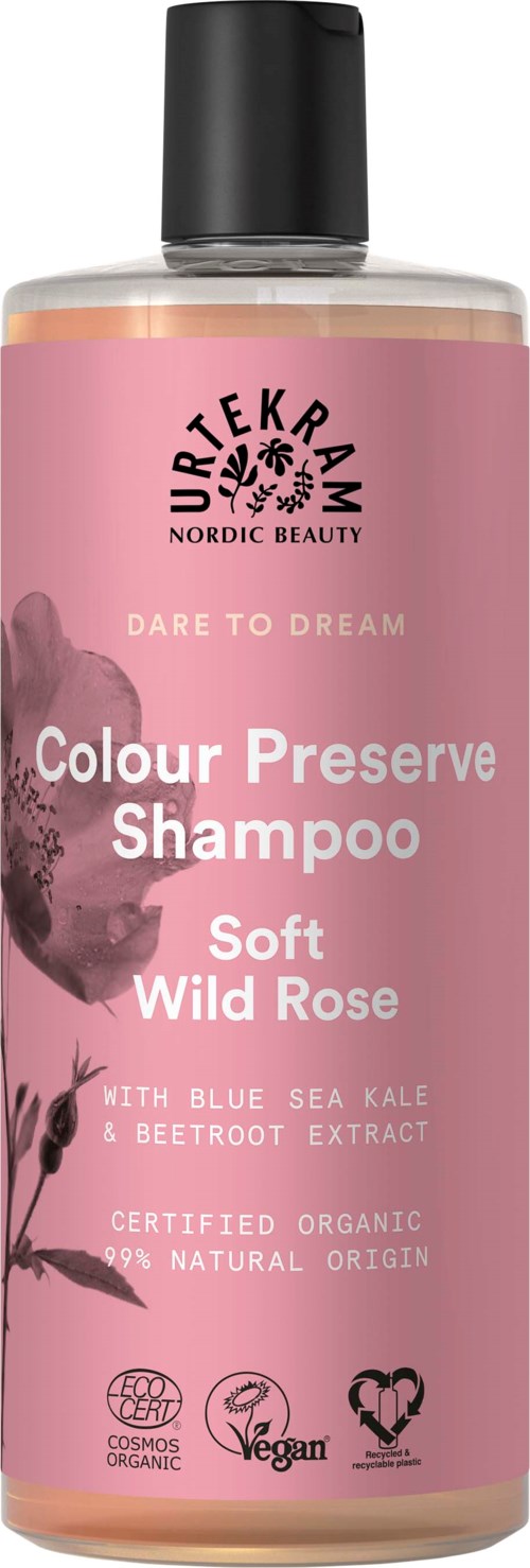 Rosa sjampoflaske med svart hette, merket Uriage, for å bevare farge og gi mykhet med villrosen.