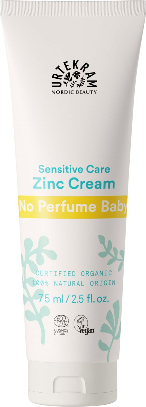 En vit tub med zinkkräm märkt som sensitiv vård, utan parfym, ekologisk, 75 ml, med gröna bladsillustrationer.
