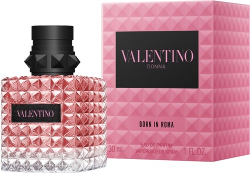 A pink and black perfume bottle with a matching pink box. The bottle has a geometric pattern and the label says Valentin Donna.