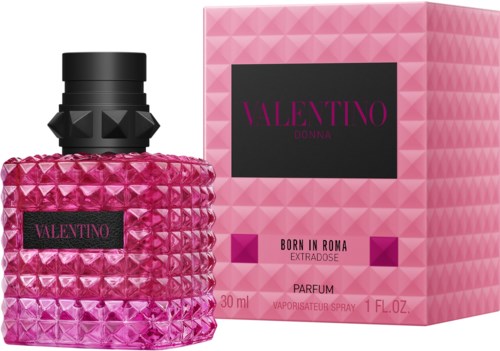 Eine rosa Parfüfflasche mit strukturierter Oberfläche und passendem rosa Karton mit Valentino Donna.