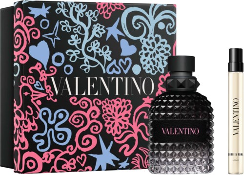 A Valentine's Day gift set with black patterned box, perfume bottle, and small spray. Valentina is written on the bottle.