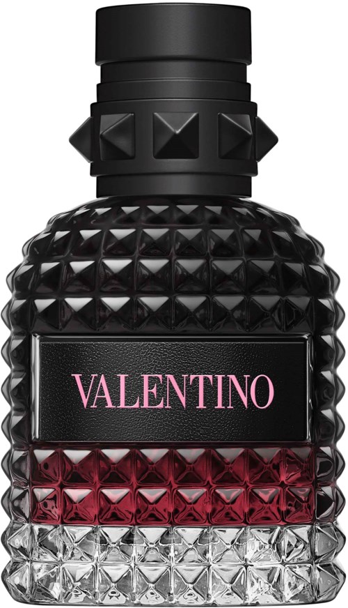 Svart parfymflaska med ett texturerat, diamantmönster och en rosa och genomskinlig gradient längst ner. Valentino-logga på etiketten.