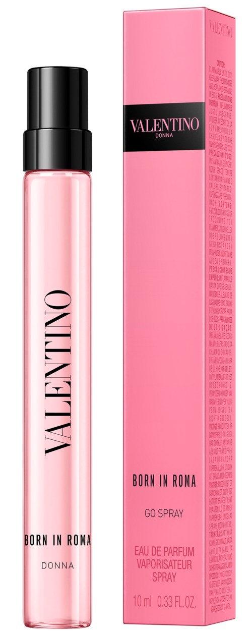A pink perfume bottle with black cap next to its pink box, labeled Valentino Born in Roma.