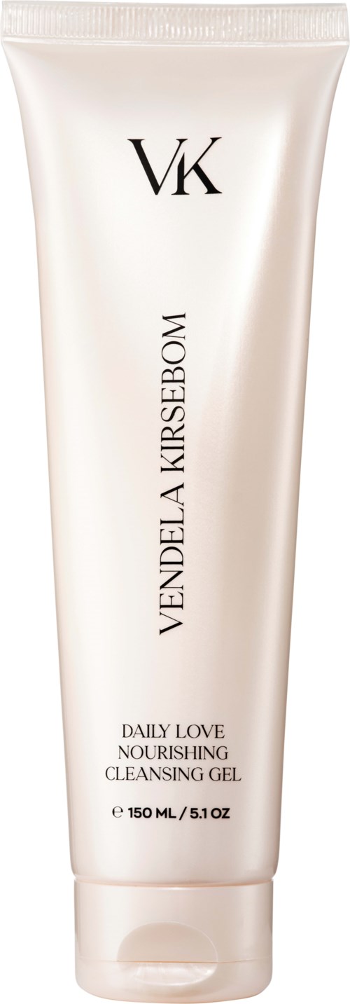 Biała tubka żelu do oczyszczania skóry, podpisana 'Vende La Kirsebom' i 'Daily Love Nourishing Cleansing Gel.'
