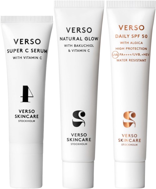 Tre vita tuber av hudvårdsprodukter med svart, grått och orange text och logotyper, står upprätt.