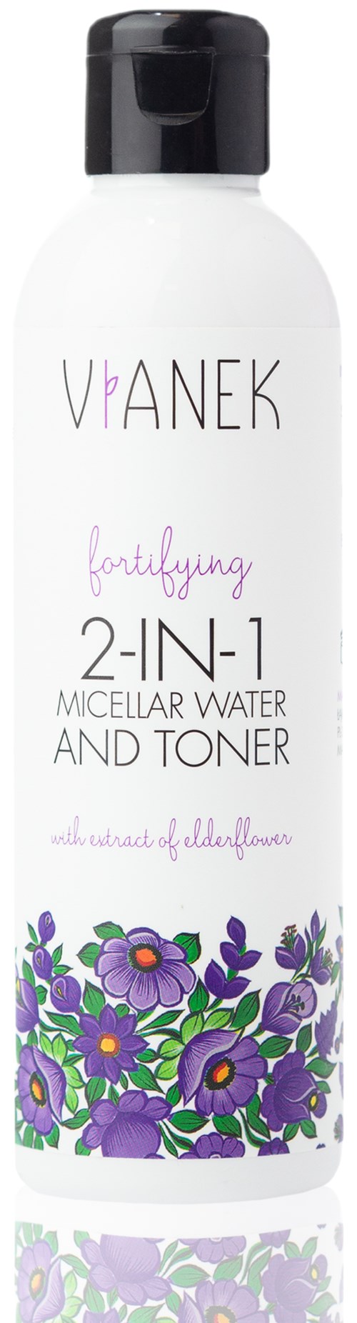 En hvid flaske med sort låg, pyntet med lilla blomster, mærket som 2-i-1 micellar vand og toner.