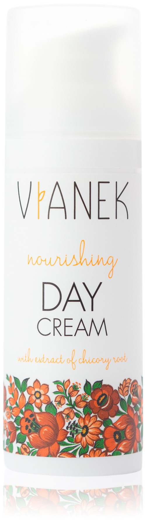 Een witte fles met oranje en groene bloemen, gelabeld "U+VANEK Nourishing Day Cream".