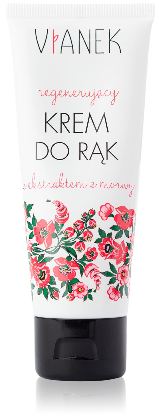 En hvit tube med blomsterdesign, tekst på polsk, og svart lokk, sannsynligvis håndkrem eller lignende kosmetikk.