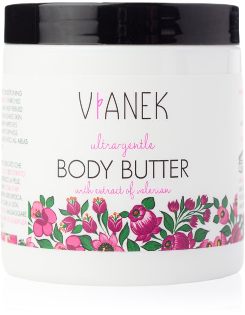 En hvid krukke med bodybutter med sort låg, dekoreret med rosa- og lilla-blomster.