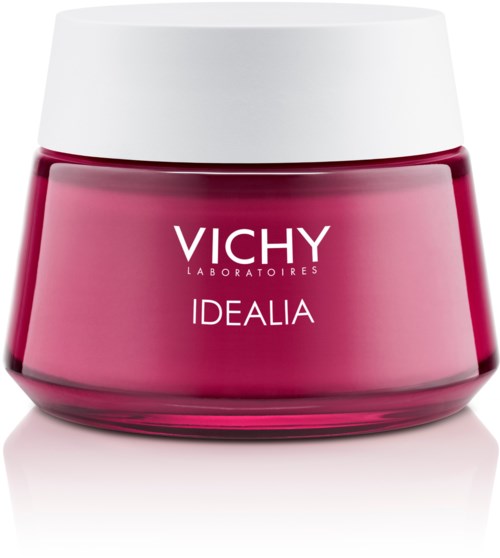 En rosa kosmetikbeholder med hvid låg, mærket 'Vichy Idealia'.