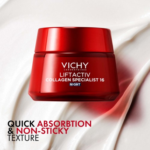 Red jar of Vichy skincare with white and blue text, on a creamy background.