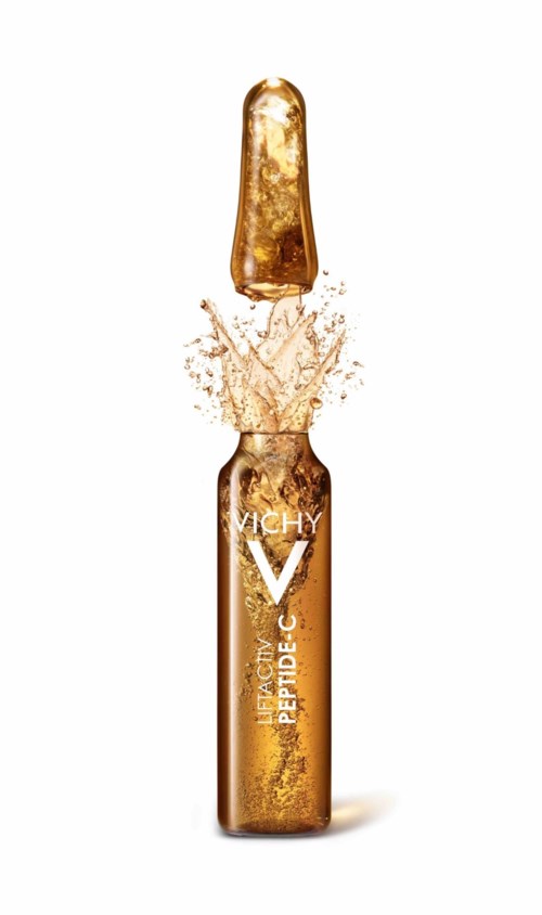 En liten flaska med guldfärgad vätska och ett sprut ut ur toppen, märkt 'Vichy Peptide-C'.