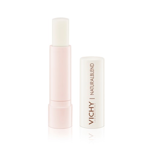 A pink and white lip balm tube with the brand name Vichy Naturallblend written on it.