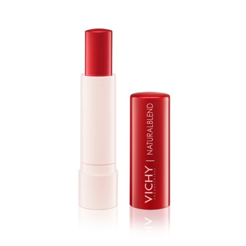 A red lipstick with a white base and a matching red cap that says 'VICHY NATURAL BLEND' besides it.