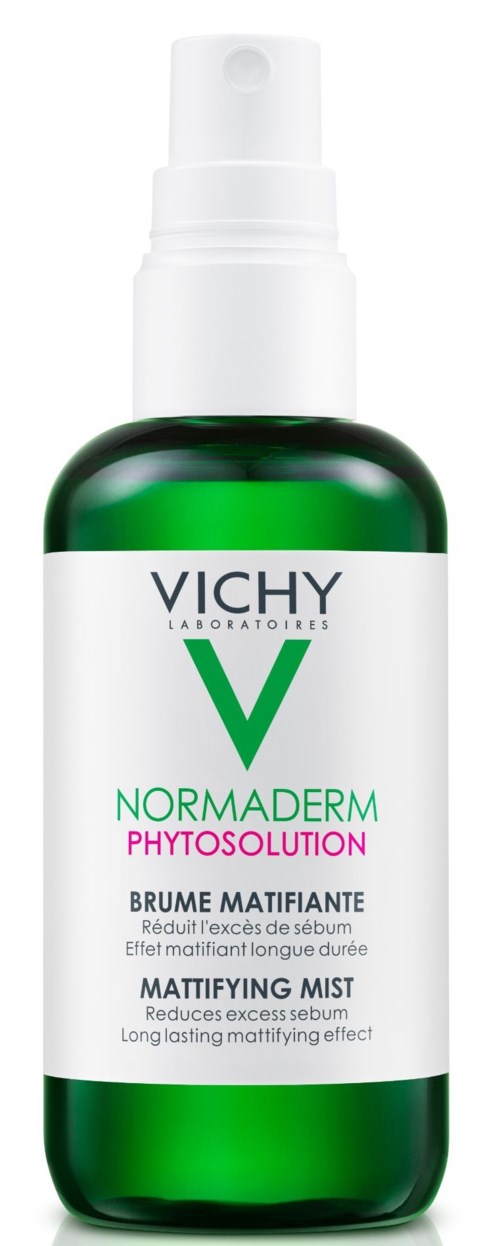 Grön flaska med vit pump, märkt Vichy Normaderm Phytosolution, för att minska överskott av olja och mattify huden.