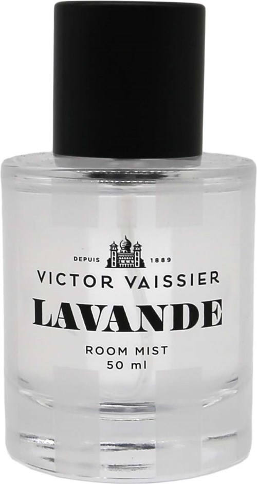 Een heldere kamerverfrisserfles met zwarte dop en eenvoudig label dat 'Lavande' en 'Victor Vaisseur' zegt.
