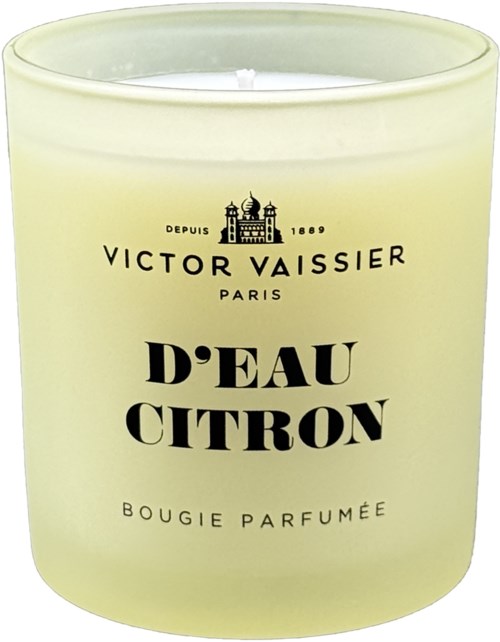 A yellow scented candle labeled Victor Vaissier D'Eau Citron, from Paris, with black text and an illustration of a building.