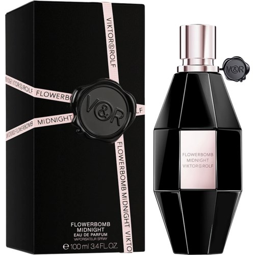 A perfume bottle and box with black, pink, and silver colors, and a wax seal with the brand initials V&R.