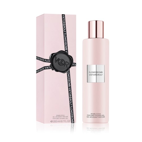 A pink perfume bottle and box with silver label and a black seal that says 'V&R' are shown.