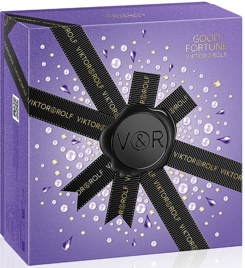 Lilla eske med vannråper, svart bånd med teksten 'VIKTOR & ROLF'. Teksten sier 'GOOD FORTUNE'.