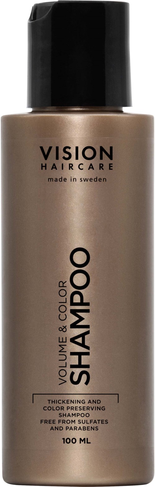 En beige flaske sjampo med svart lokk, merket 'VISION HAIRCARE', for volum og fargebeskyttelse.