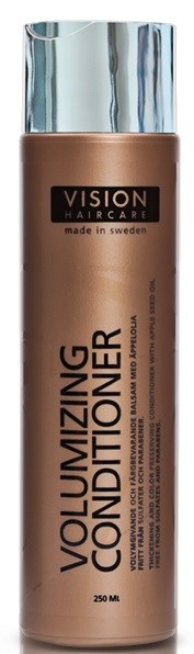 En brun flaske merket 'Vision Haircare' med volumforsterkende balsam og sølvfarge på lokket.