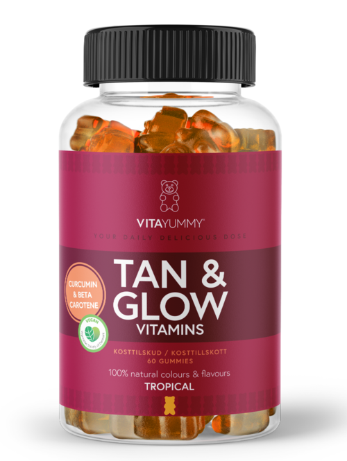Flaske med vitaminer merket 'Tan & Glow Vitamins' med oransje og gule geléaktige godbiter inni.