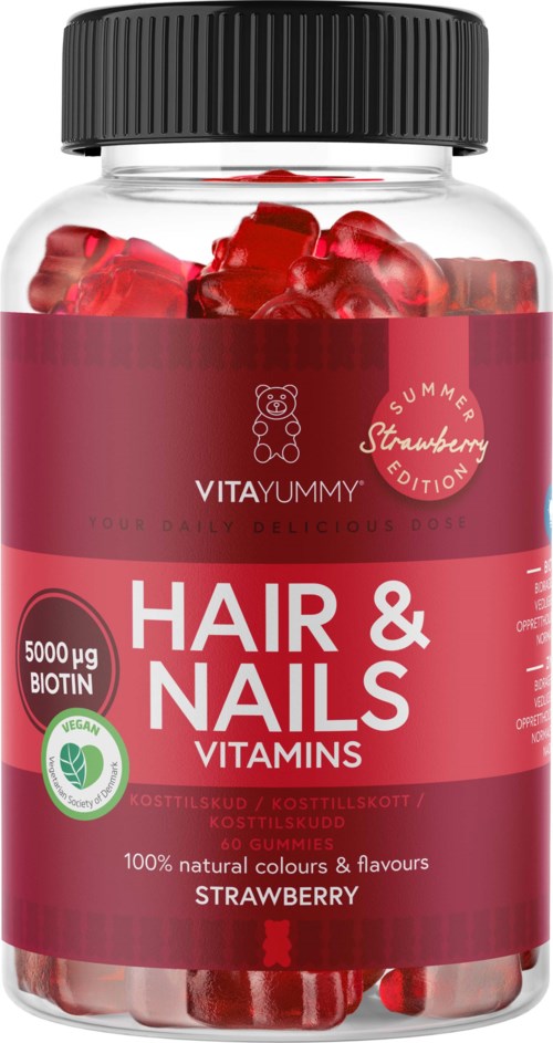 En flaska med röda gelébitar tillägnad hår och naglar med jordgubbar, vitaminer och naturliga färger.