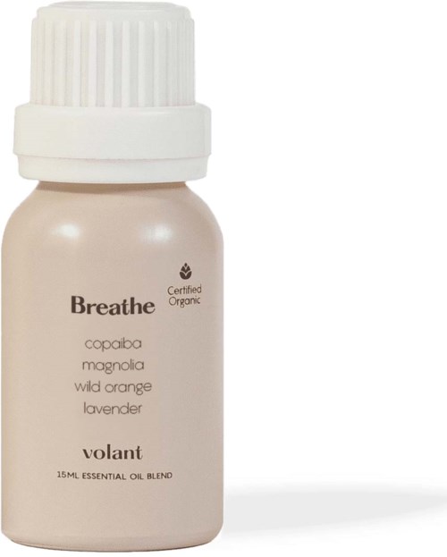 A small beige bottle labeled 'Breathe' with natural ingredients like orange and lavender, containing essential oil blend.