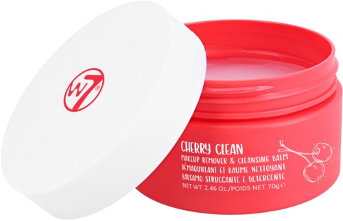 Een roze container met een witte deksel, met een kersillustratie en tekst voor make-up remover en reinigingsbalsem.