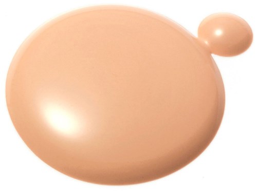 Eine große pfirsichfarbene Ellipse mit einem kleineren runden Anhang oben rechts.
